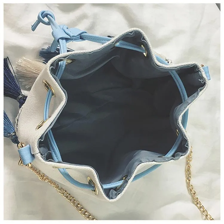 National Wind Mini Diagonal Canvas Bucket Bag