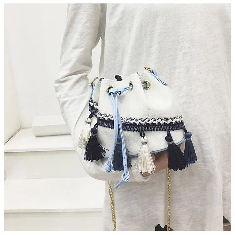 National Wind Mini Diagonal Canvas Bucket Bag