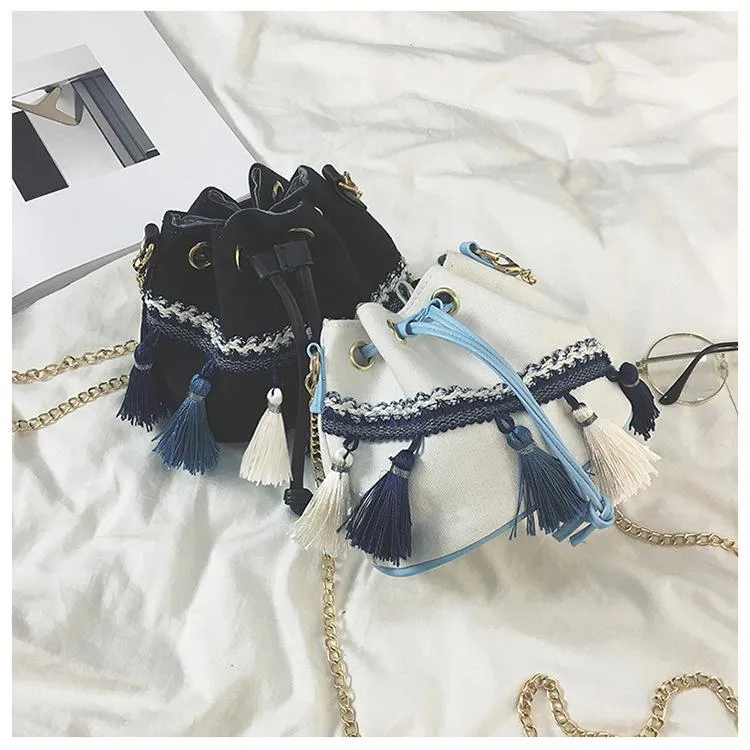 National Wind Mini Diagonal Canvas Bucket Bag